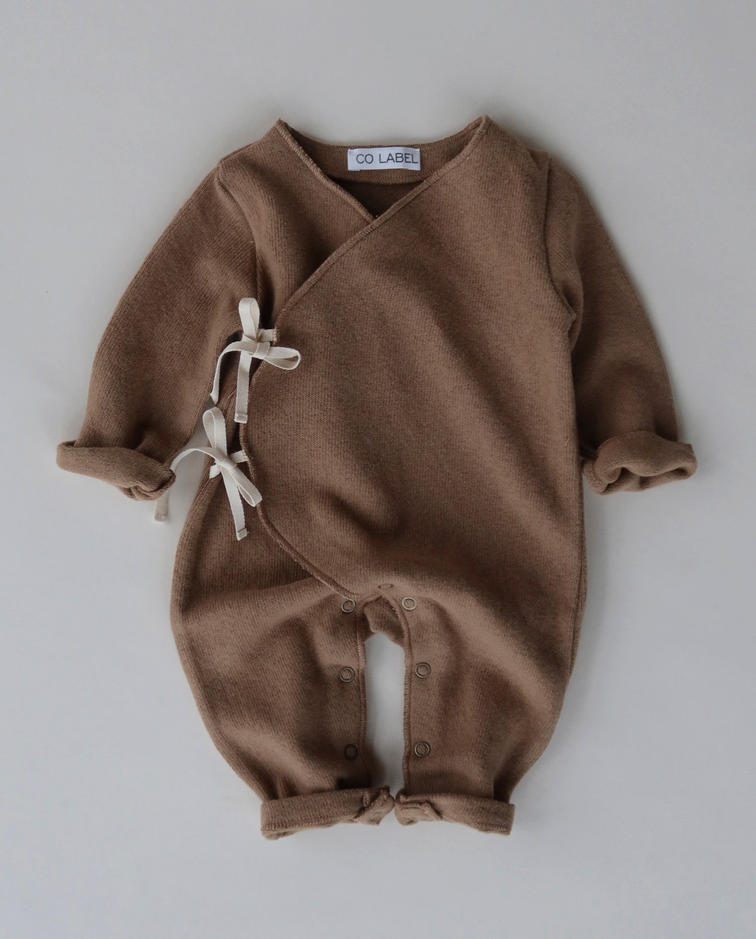 WARM EDDIE BABYSUIT - CO LABEL
