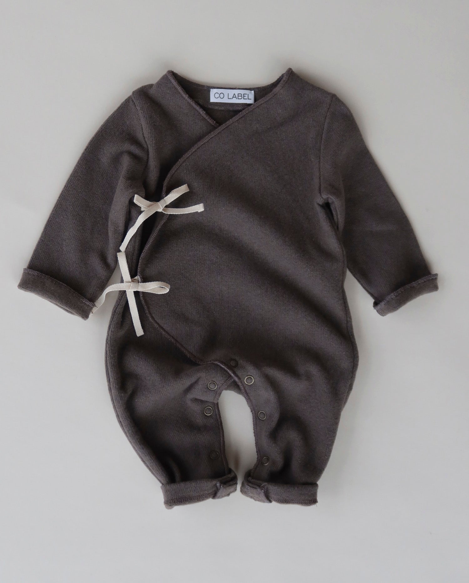 WARM EDDIE BABYSUIT - CO LABEL